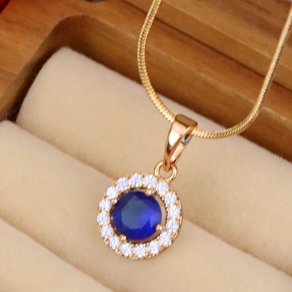 "Rose Gold Round Pendant with Blue Center Stone and White Halo, XPPT1873